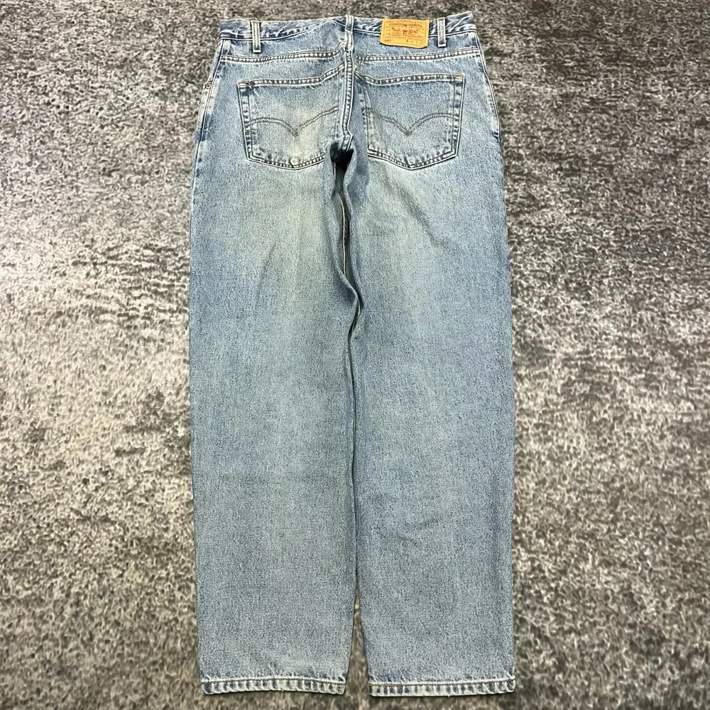 Vintage Levi's 560 Loose Fit Tapered Leg Jeans Mens 34x31 Blue Light Wash 90s